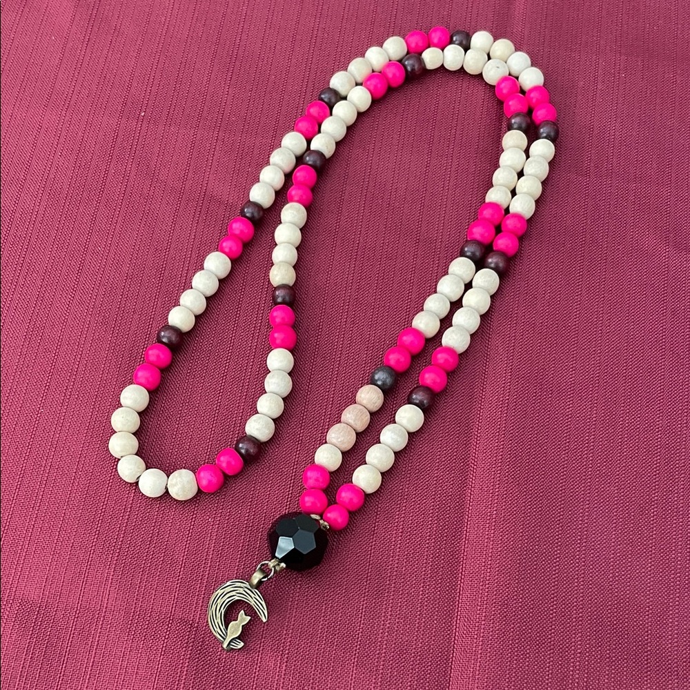 Hand assembled beaded necklace brass cat sitting on half moon